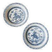 Pair of antique Chinese decorative plates with dragon motif.
