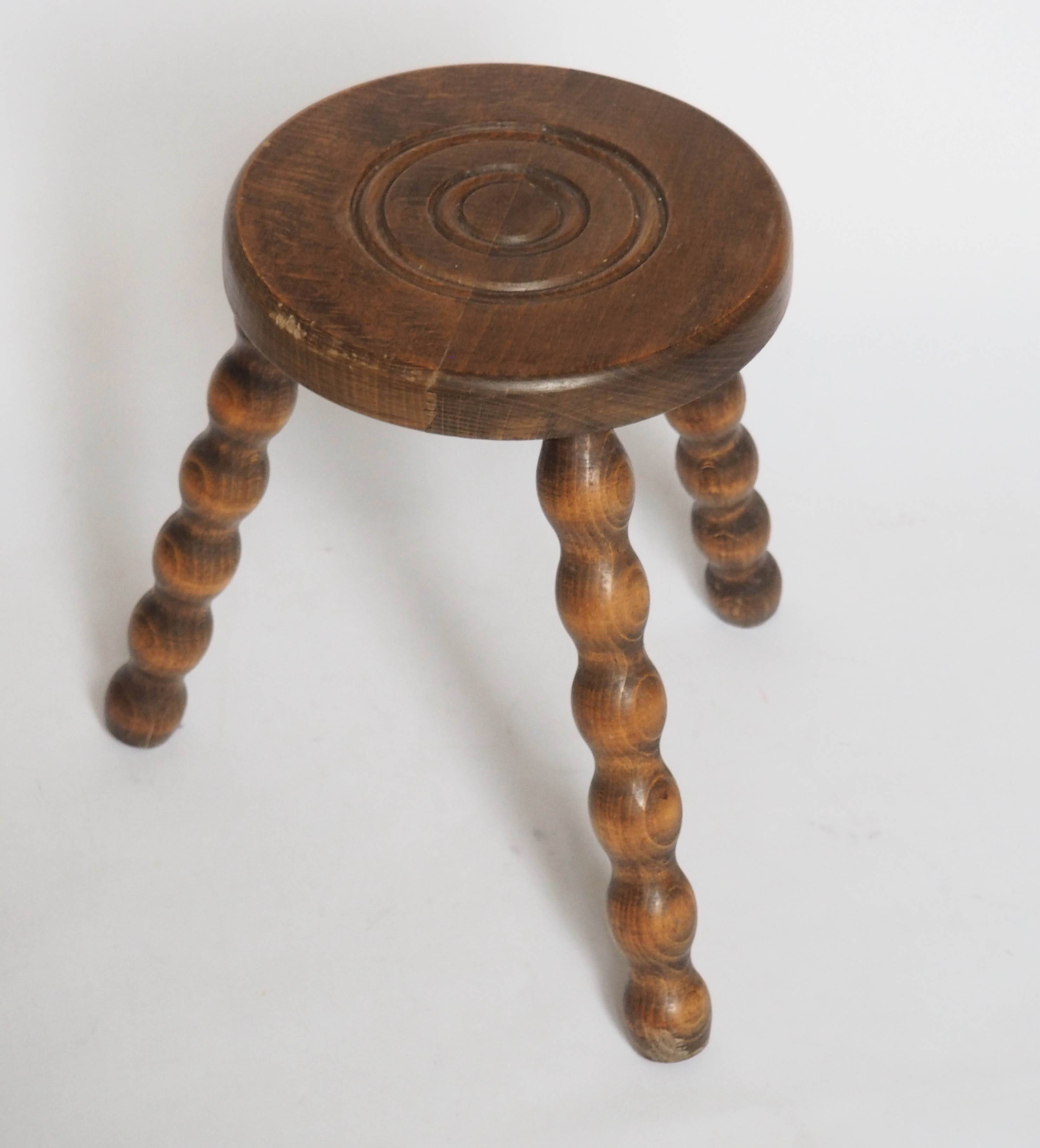 Beaded wooden tripod stool