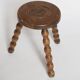 Beaded wooden tripod stool