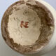 Old ceramic jug with floral decoration