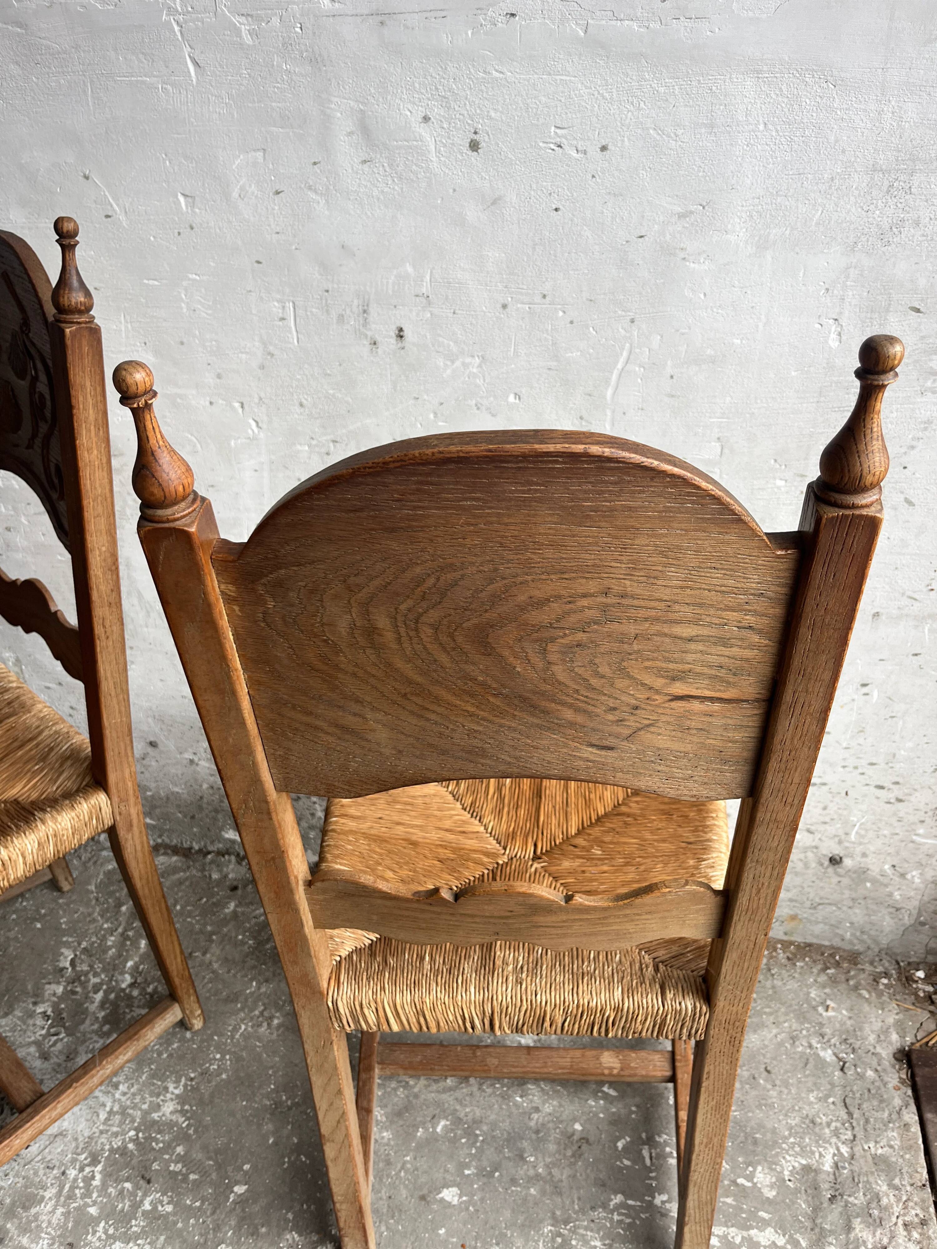 Set of 6 sculpted oak chairs with straw seats – 1950s