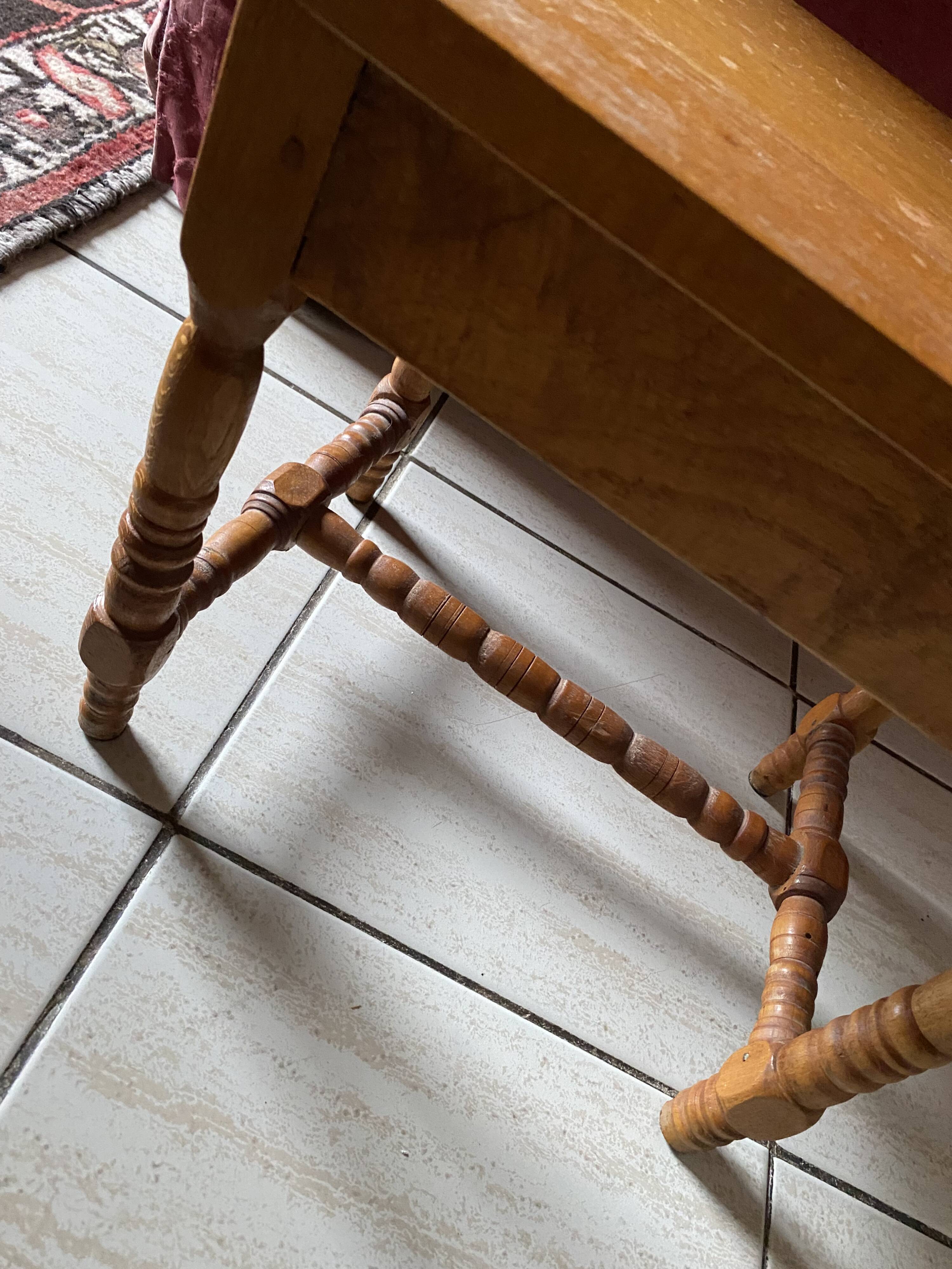 Small footrest bench in bohemian style.