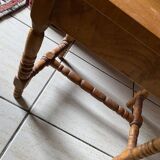 Small footrest bench in bohemian style.