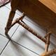Small footrest bench in bohemian style.