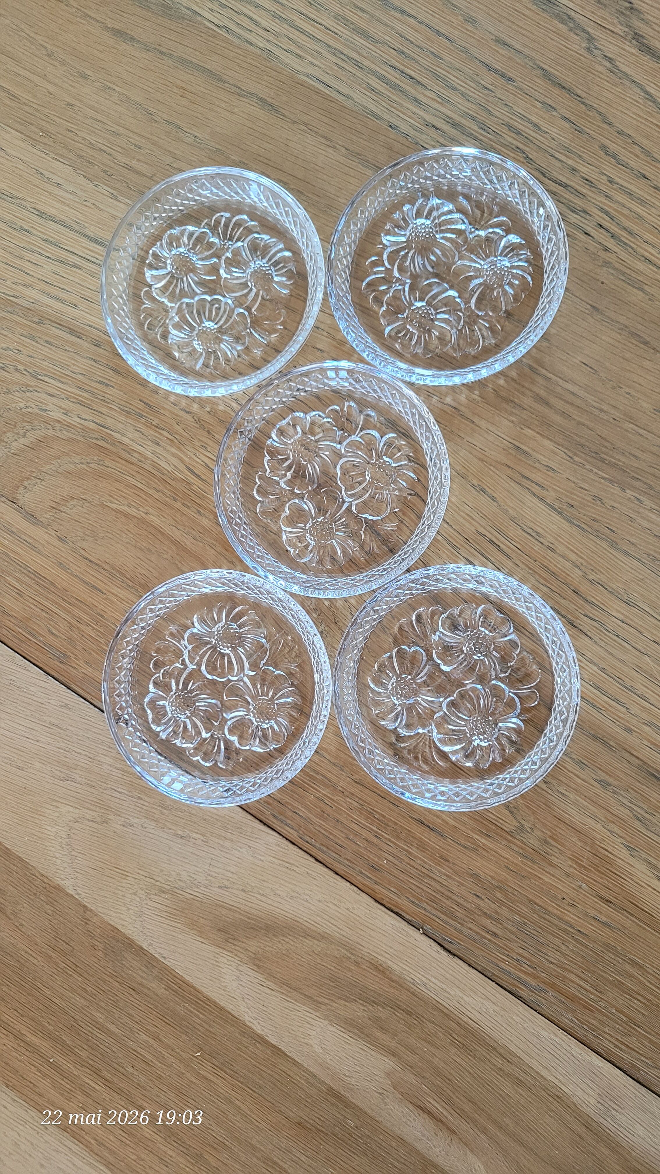 5 transparent glass coasters