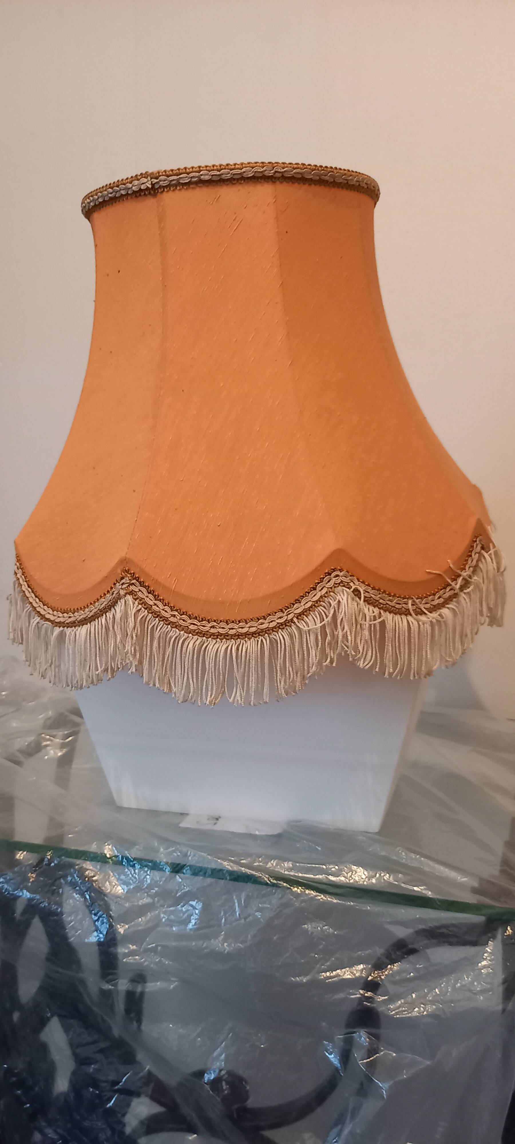 Orange tone silk lampshade with 9 ribs.