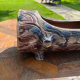 Lot of sandstone planter in the shape of logs