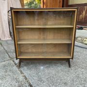 Mid-century brown wooden library (beech & pine) with glass doors from the 1960s.