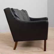 Danish black leather and rosewood sofa