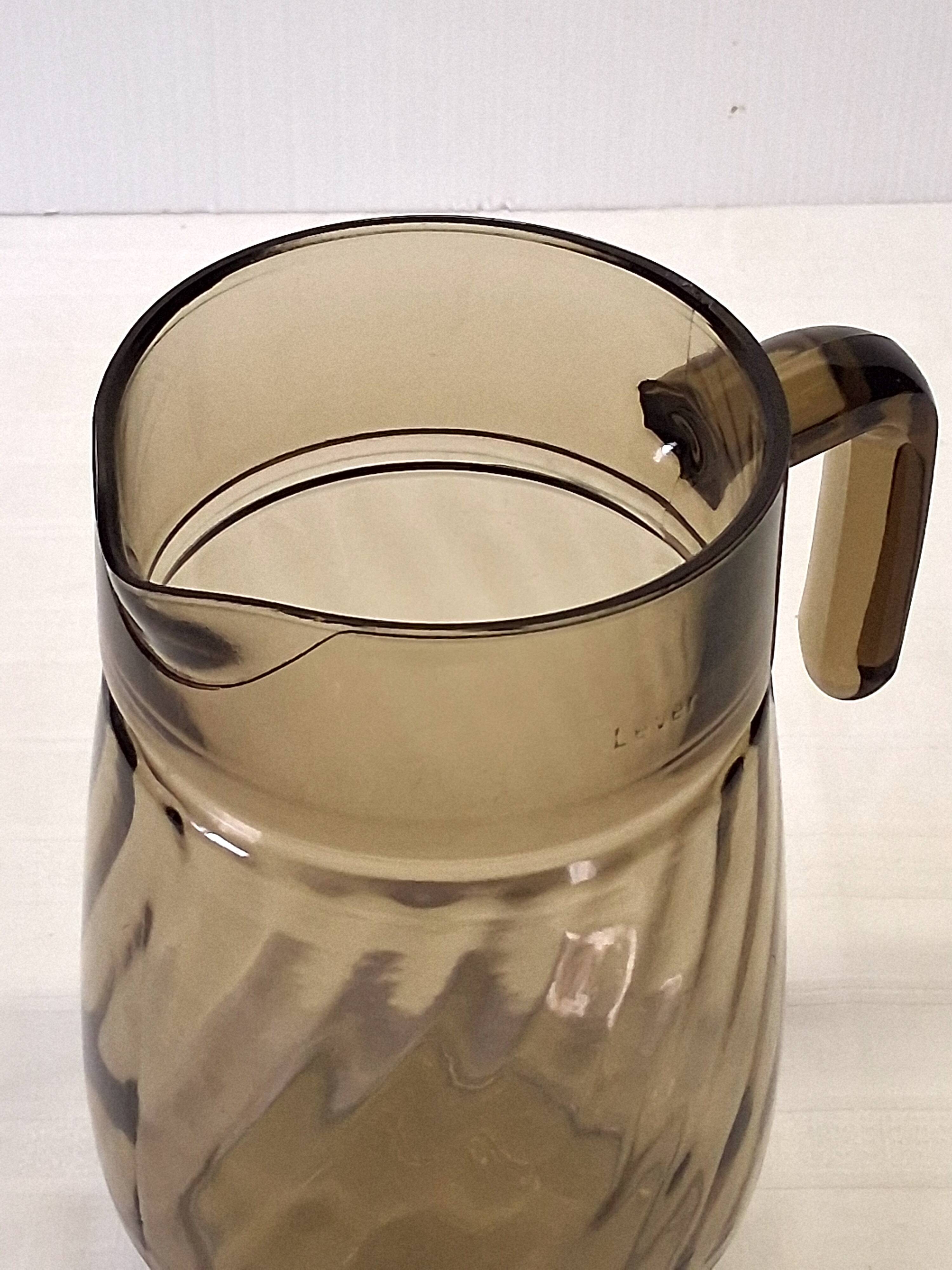 Very pretty black smoked glass pitcher from Lever in very good condition.