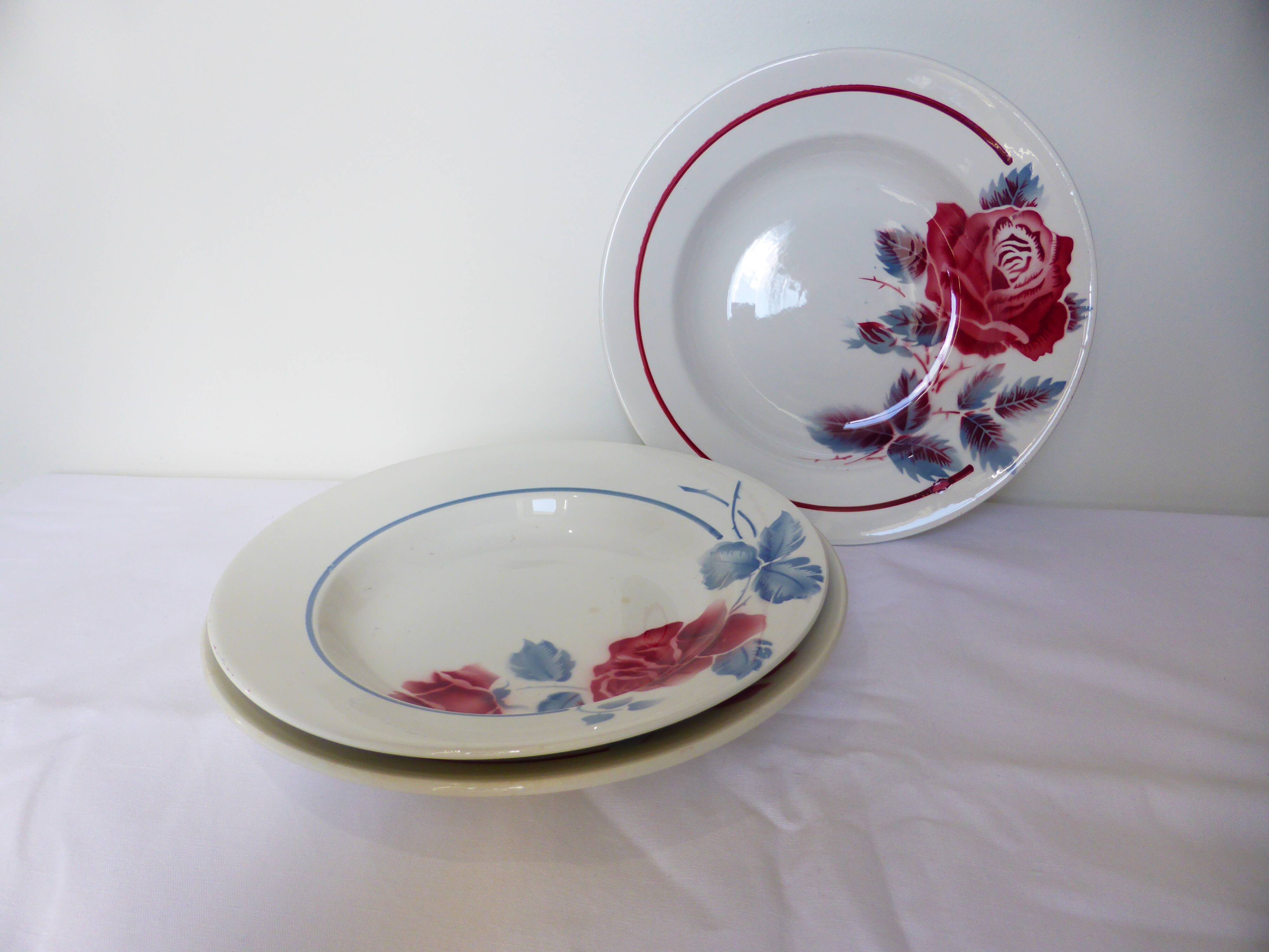 3 vintage soup plates in a jumble