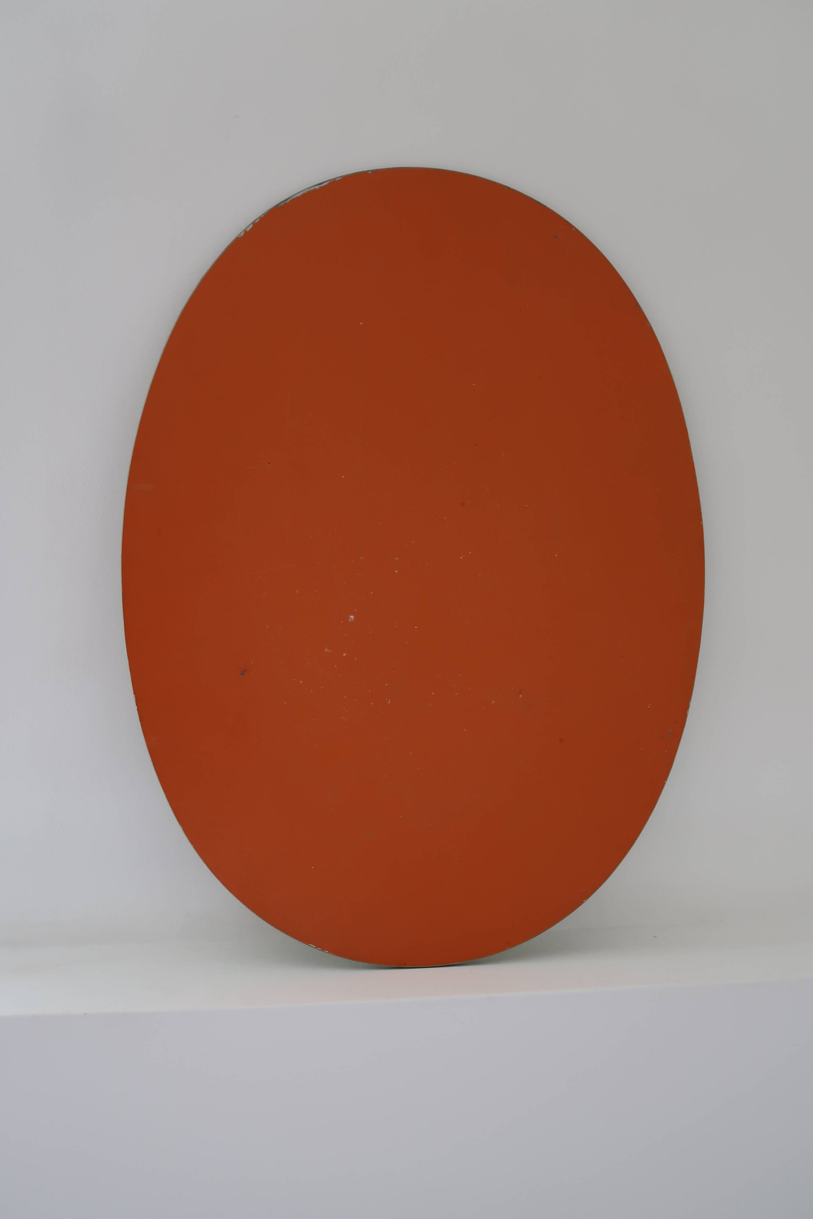Vintage bevelled oval mirror