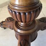 Wooden gueridon with marble, lion paw legs.