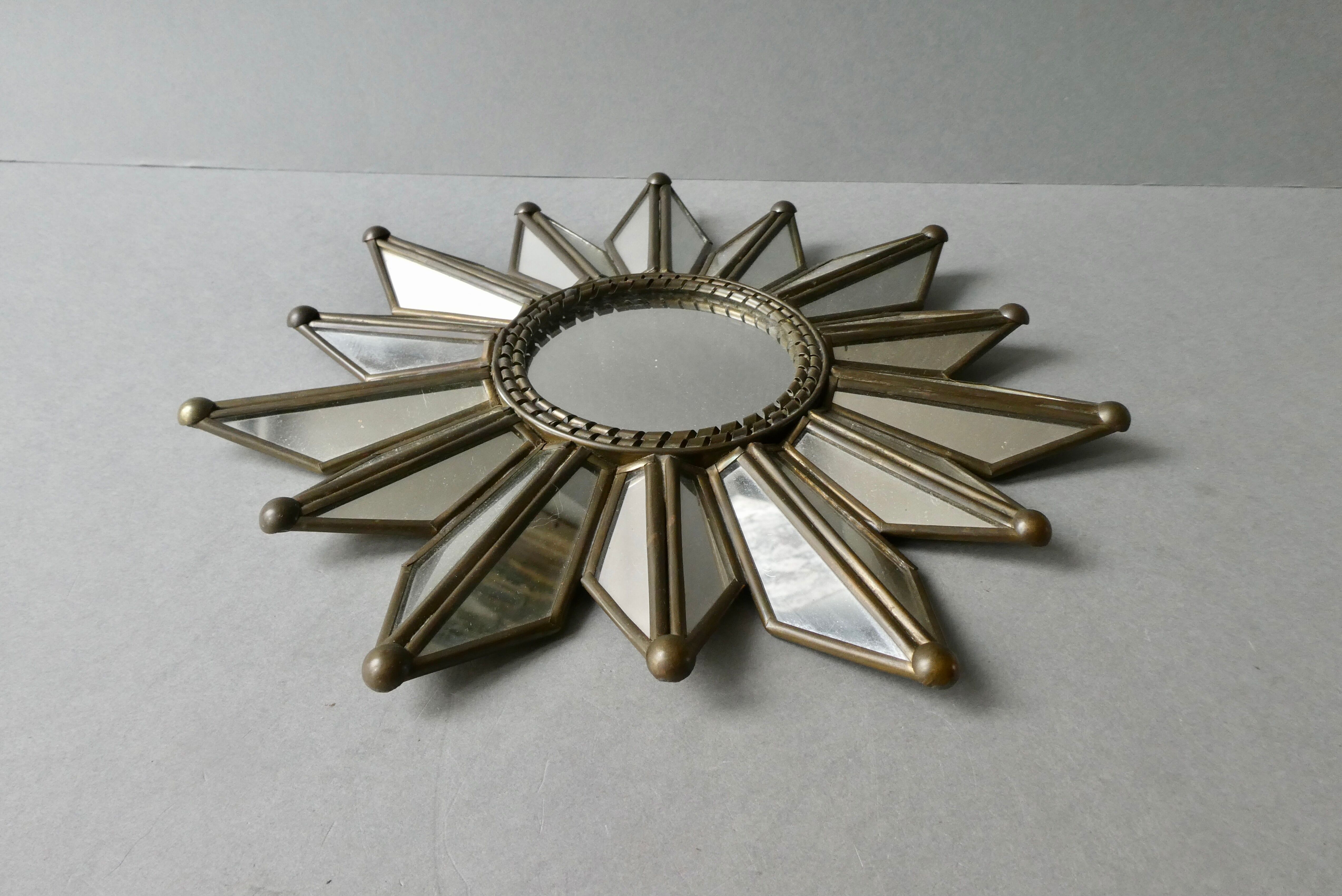 Mirror shape sun with parecloses of mirrors