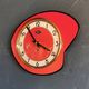 Vintage formica clock silent asymmetrical wall pendulum "Doby Matic red"