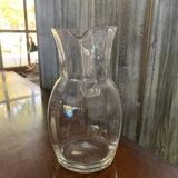 Transparent glass pitcher Mid-Century (1960s) — Czech Republic, bulbous silhouette and integrated handle.