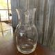 Transparent glass pitcher Mid-Century (1960s) — Czech Republic, bulbous silhouette and integrated handle.