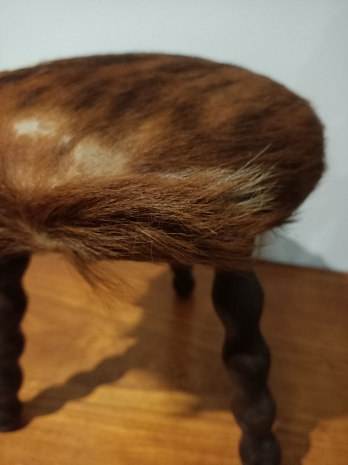 Duo of cowhide stools