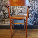 Vintage curved wood armchair