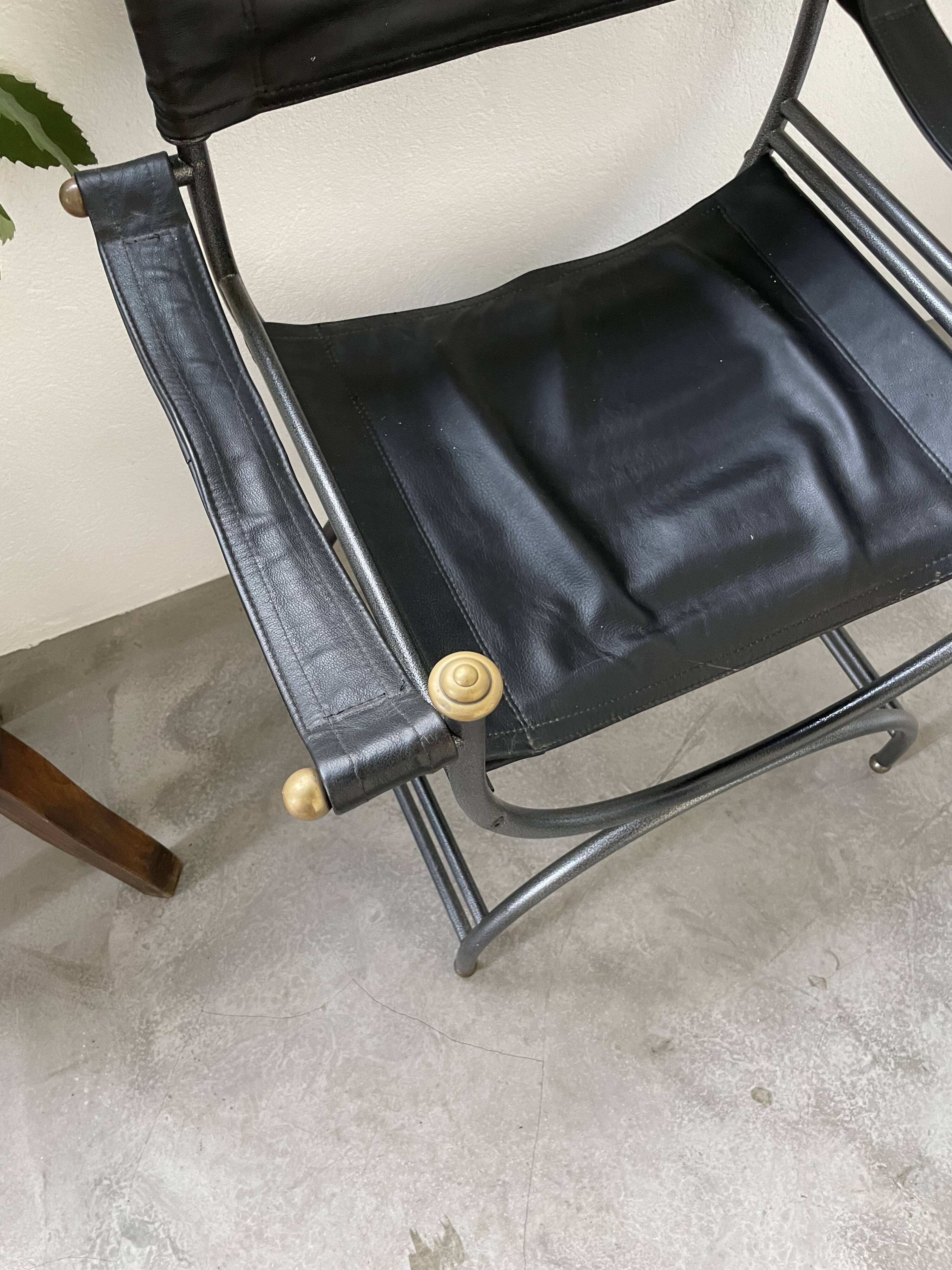 Pair of leather “curule” emperor armchairs