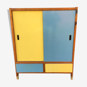 Vintage sideboard with 2 sliding doors in yellow and blue Formica and 2 drawers.