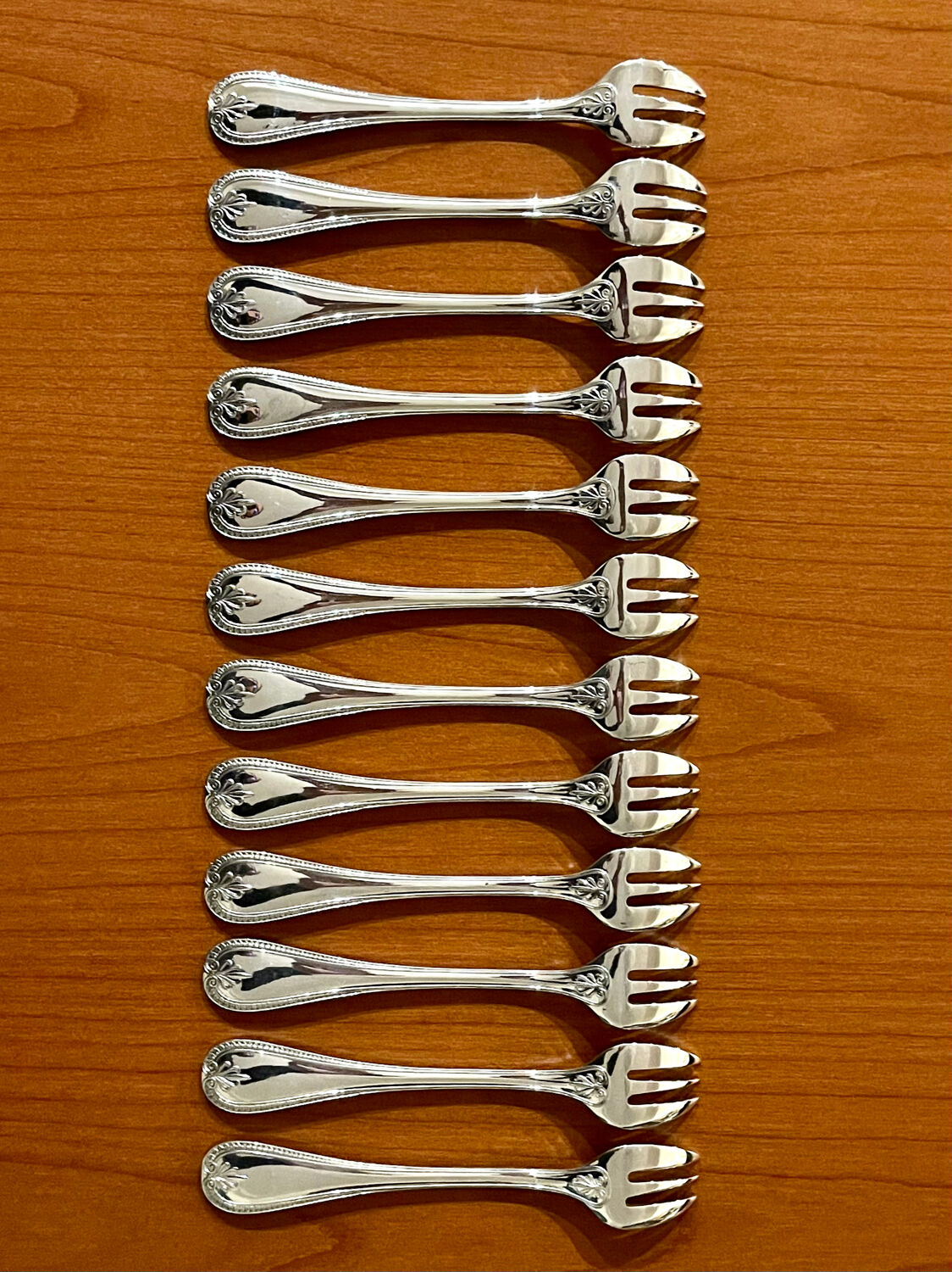 Christofle Malmaison 12 oyster forks, new condition