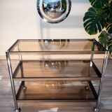 ERARD console (France), black metal and smoked glass side table, 1980.