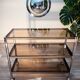 ERARD console (France), black metal and smoked glass side table, 1980.
