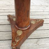 Pedestal table above marble