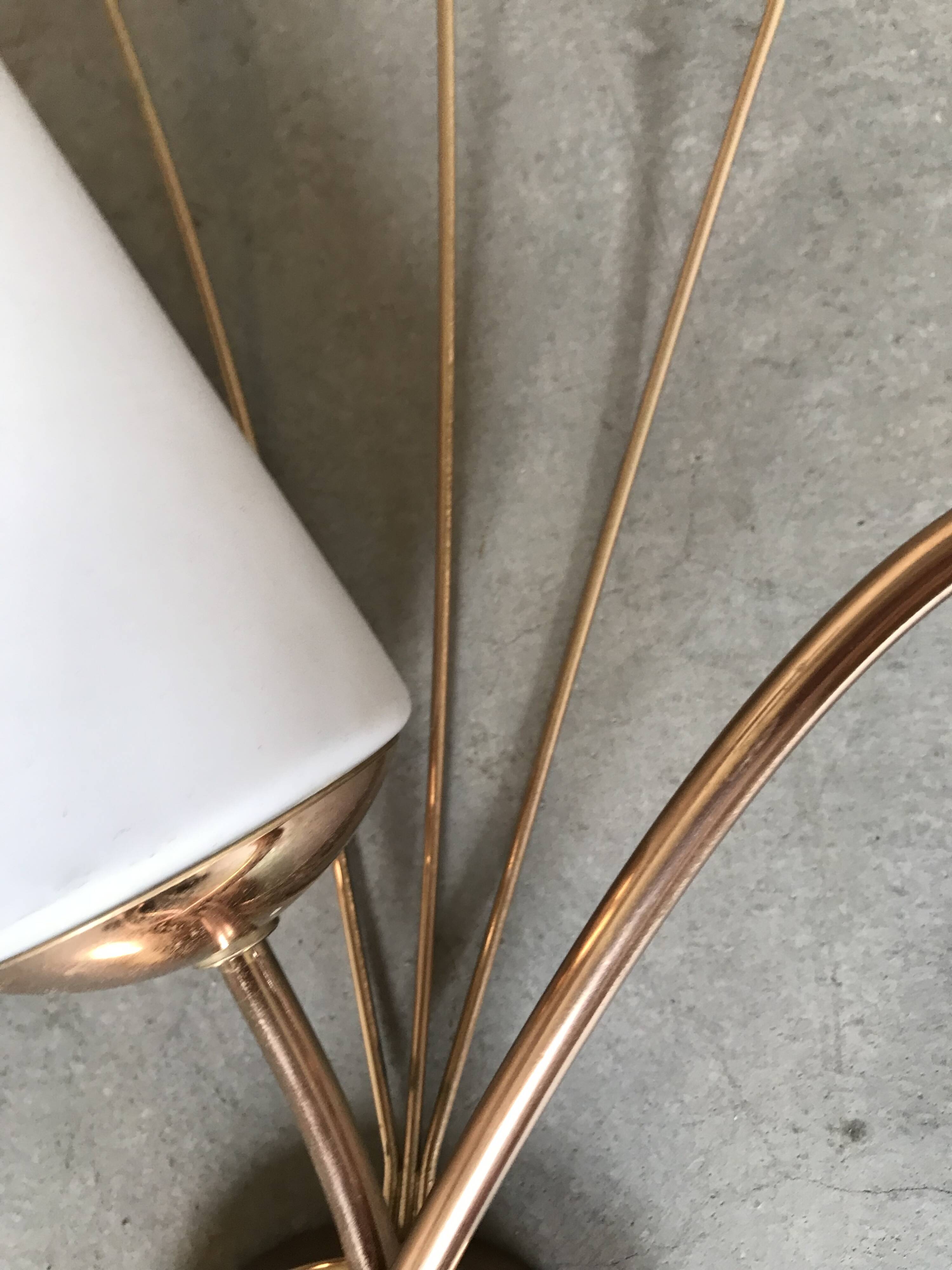 Pair of brass wall lights, circa 1950.