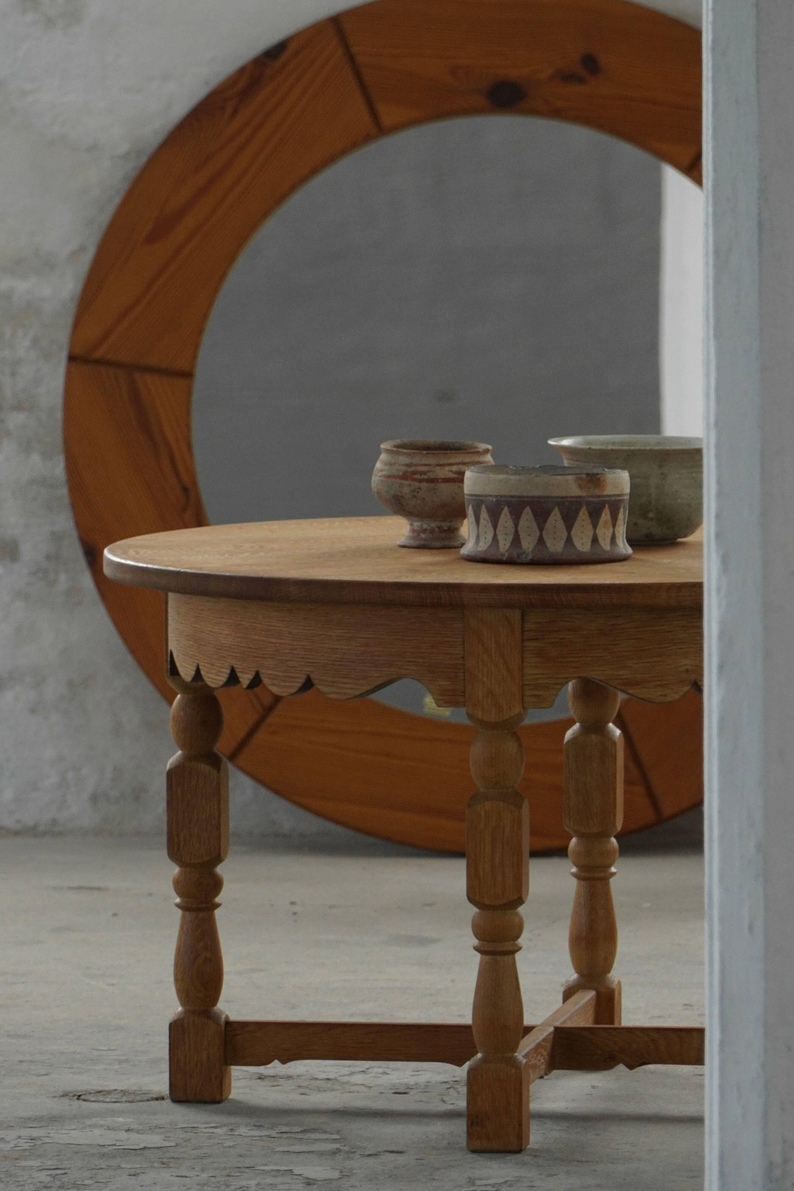 Mid-century Danish round side table in solid oak, Henning Kjærnulf, 1960s.