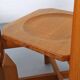 Set of 4 dining chairs in elm wood and cognac leather.