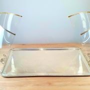 Large serving platter with lid, in silver metal.
