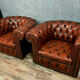 Pair of Chesterfield club armchairs in burgundy circa circa 1920 upholstered leather