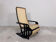 Rocking lounge chair, curved wood, leather, Viennese cane design.