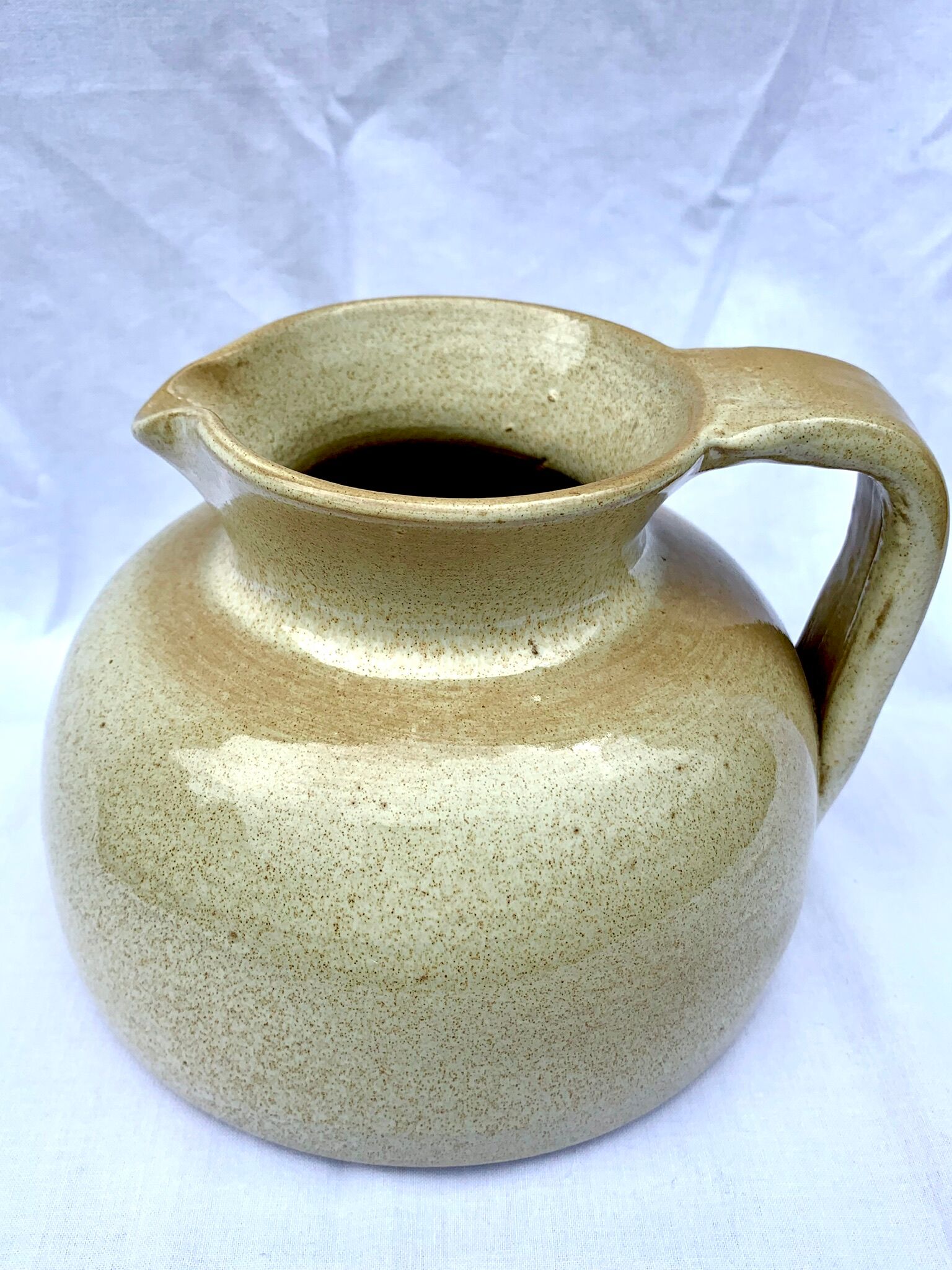 Vintage pitcher in enamelled sandstone