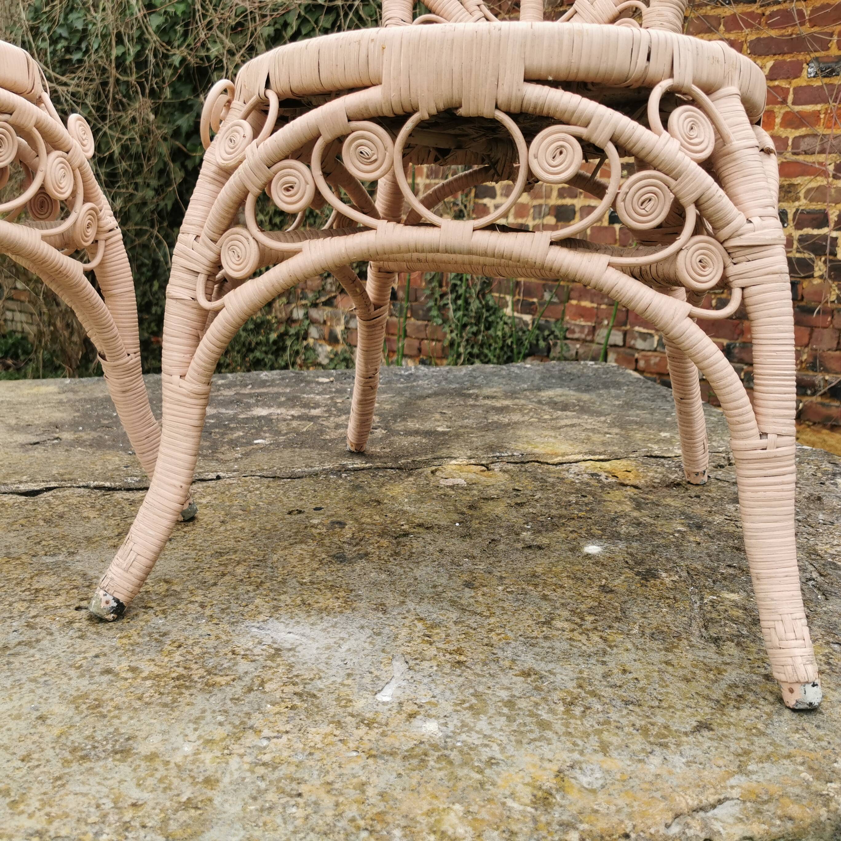 Pair of Peacock rattan chairs