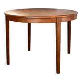 Teak round table with butterfly extension