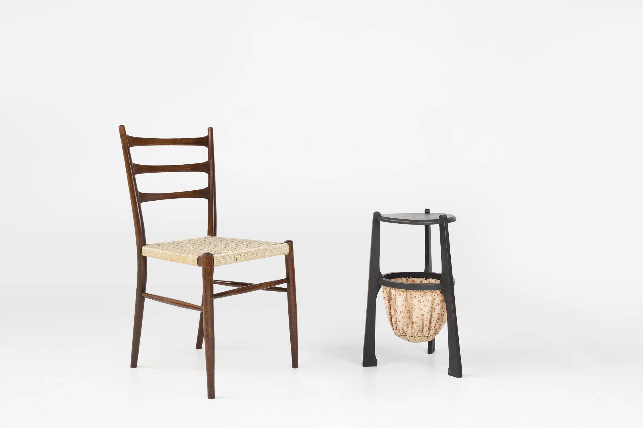 Art Nouveau side table in blackened wood with storage basket, Belgium ca. 1910