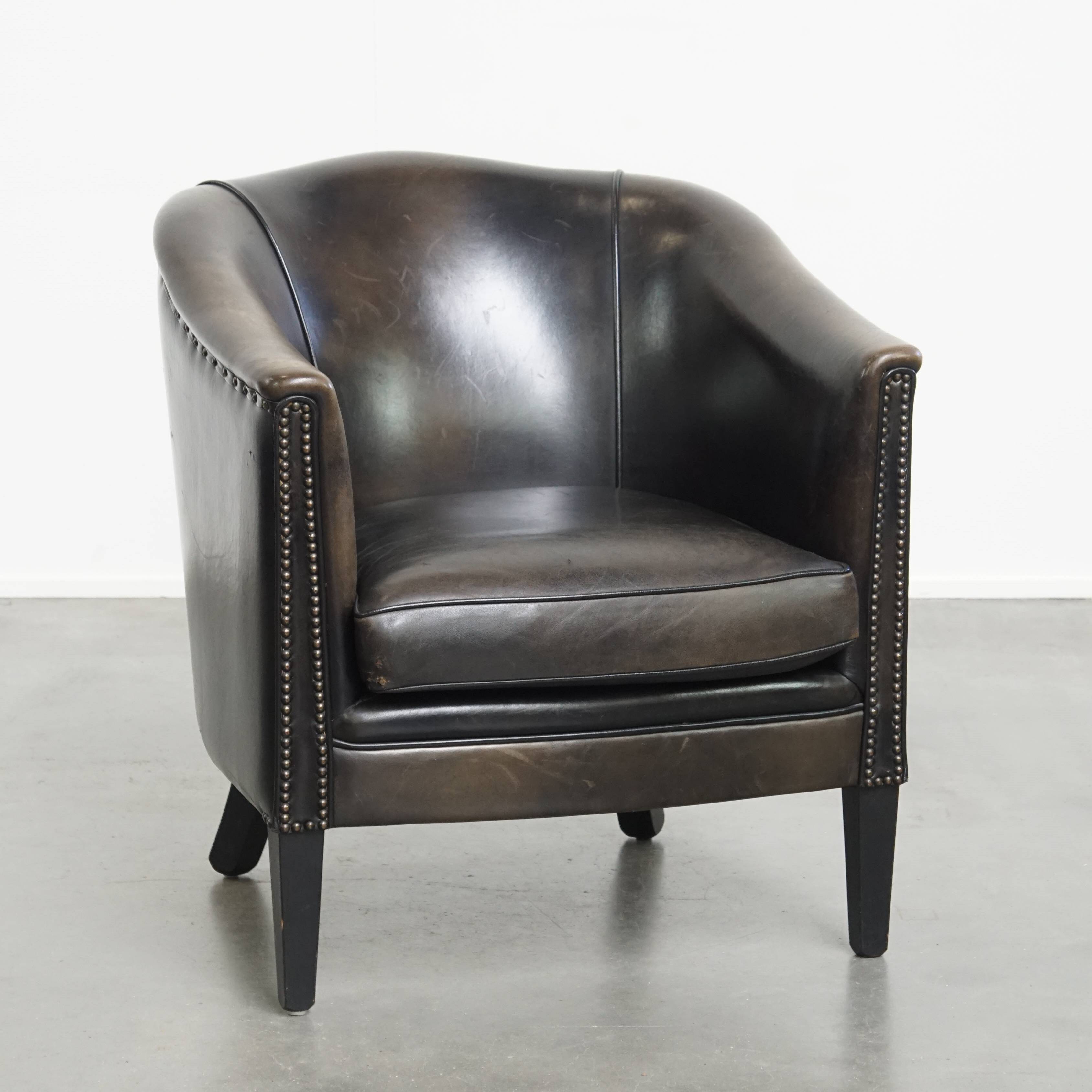 Fauteuil club noir/gris en cuir de mouton