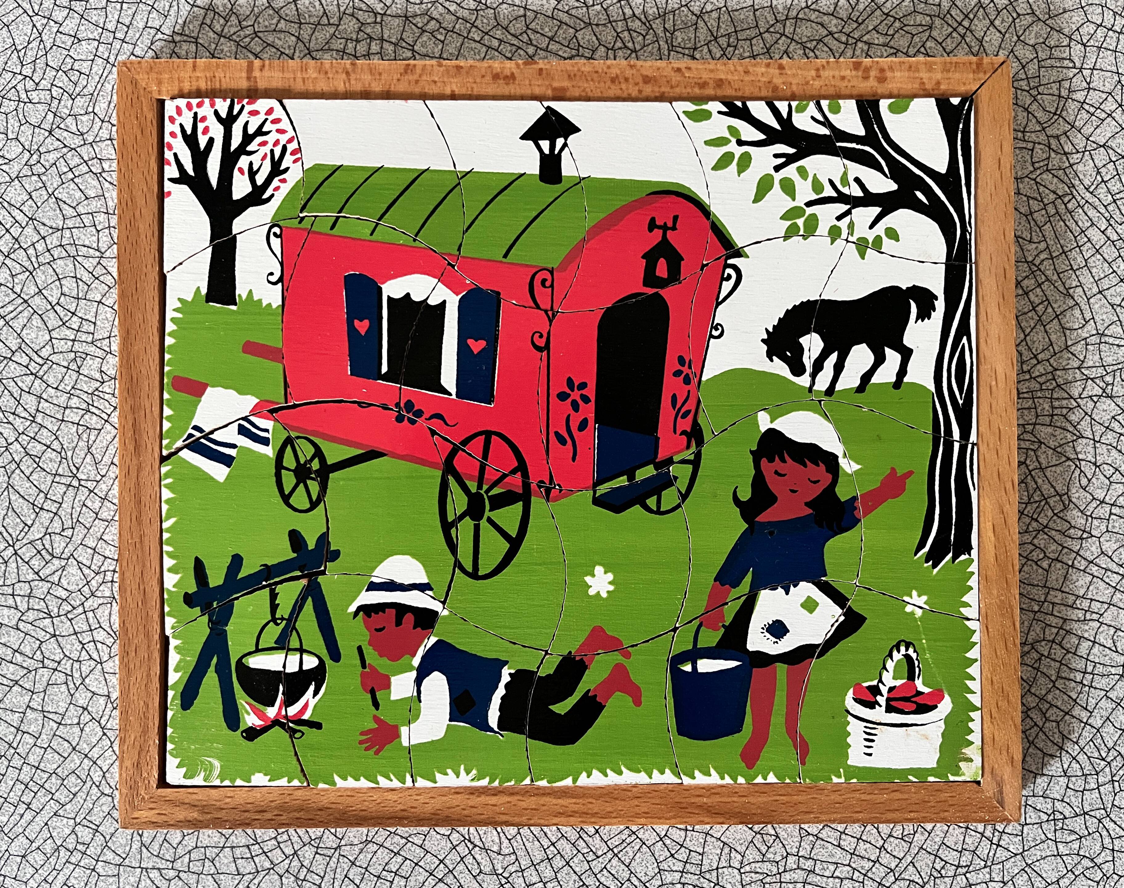 Wooden frame puzzle from the 1940s/50s depicting a caravan campsite.