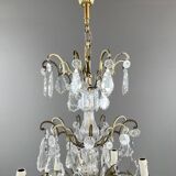 Bronze, brass and crystal chandelier, early 20th century.