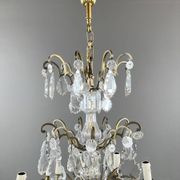 Bronze, brass and crystal chandelier, early 20th century.