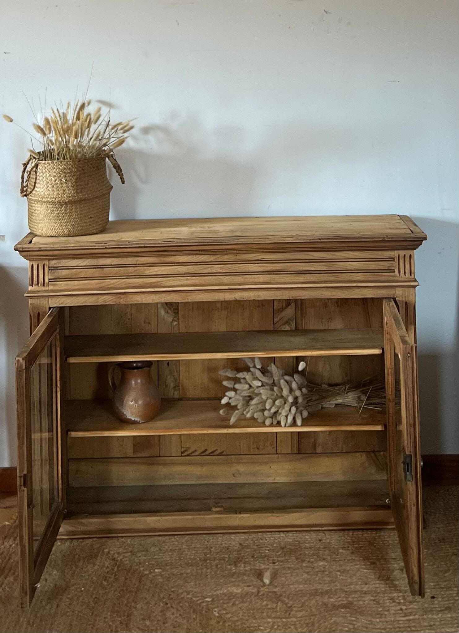 Old glass-fronted Parisian buffet in raw solid wood