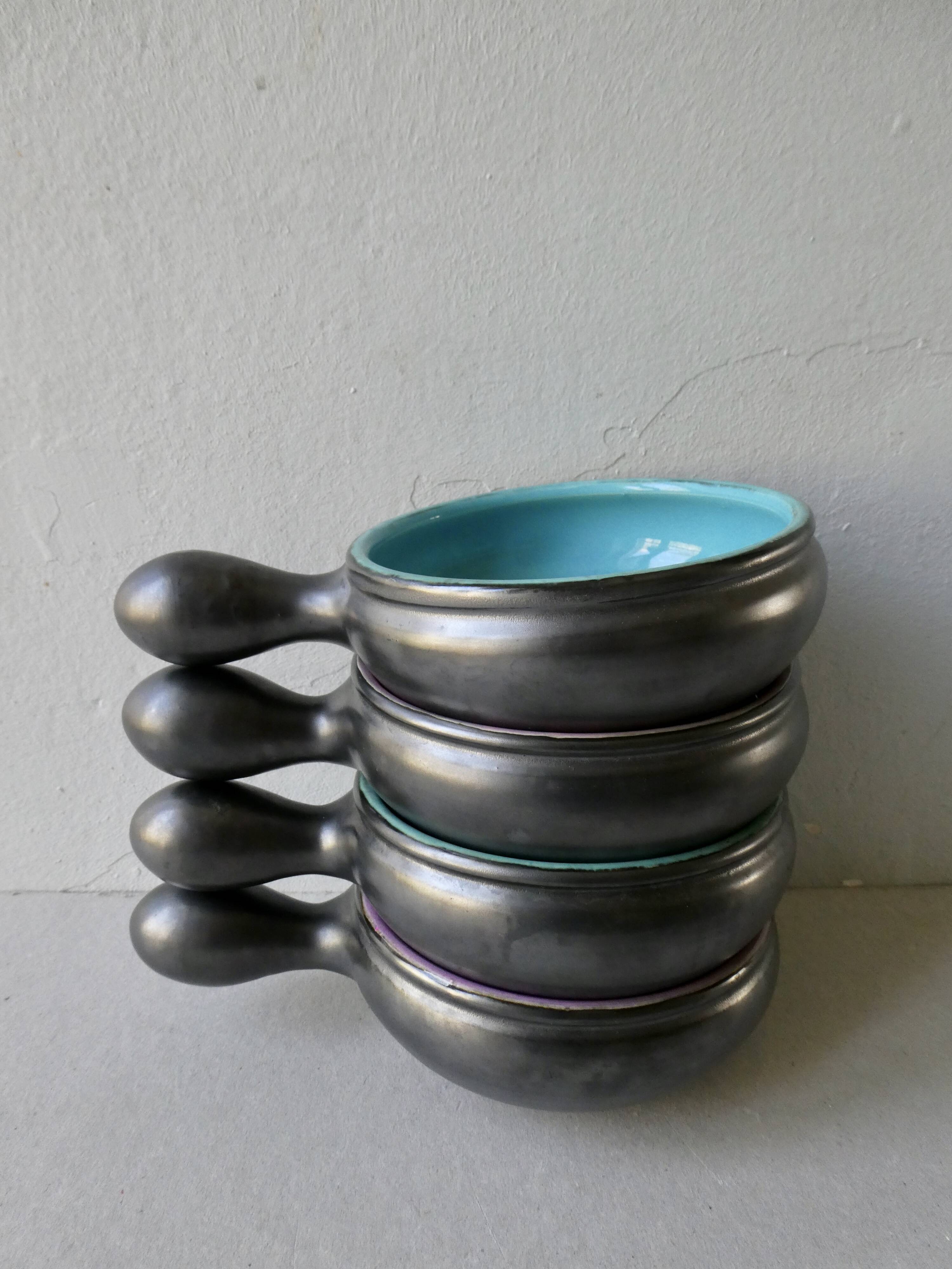 Lot of 4 black and colored ceramic cups