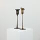 Pair of vintage brass candle holders with tulip decoration.