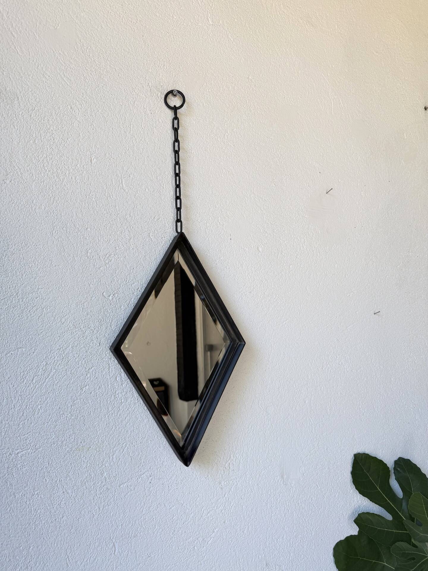 Miroir brutaliste losange en fer