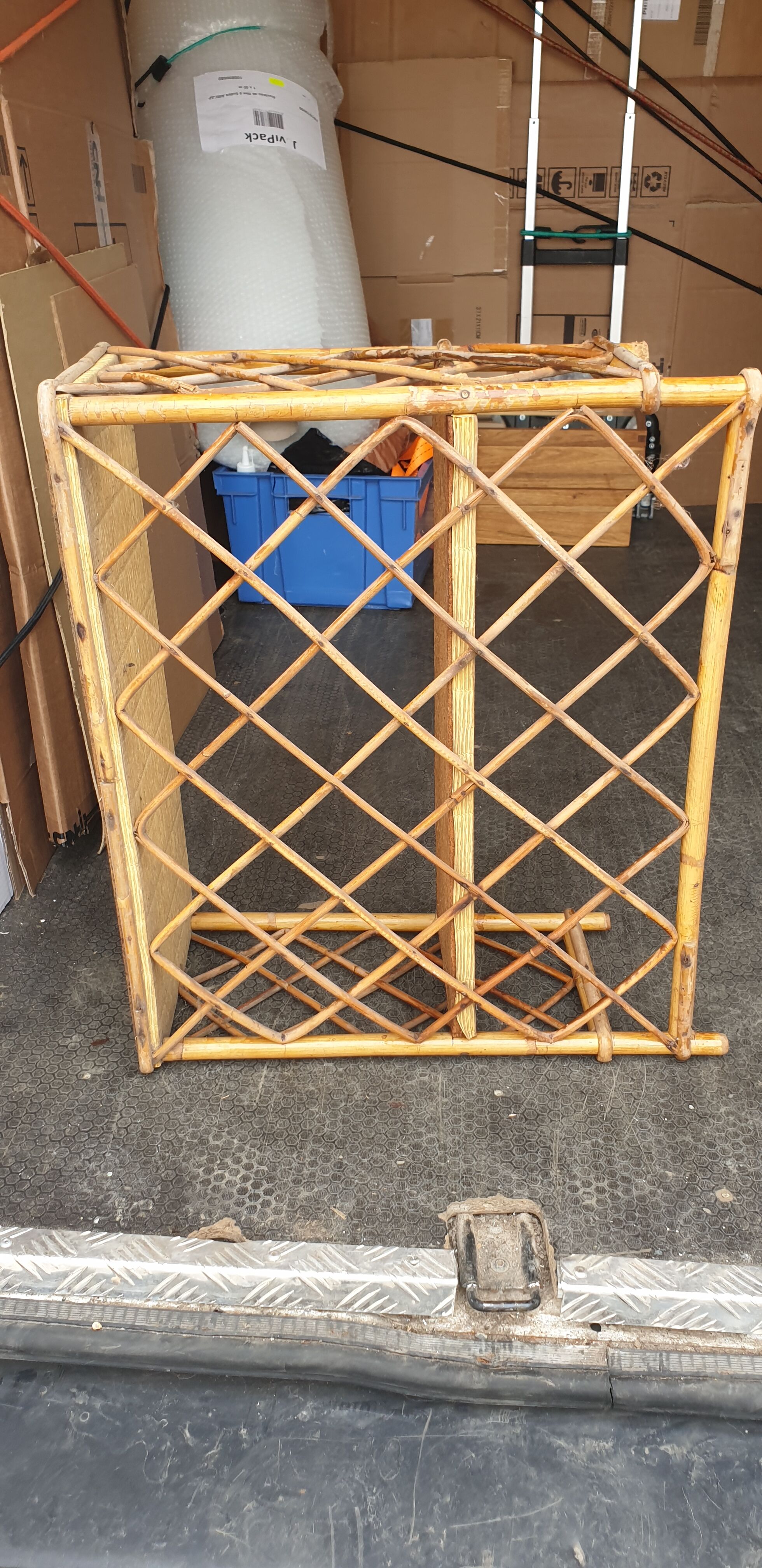 Colonial style rattan wall shelf