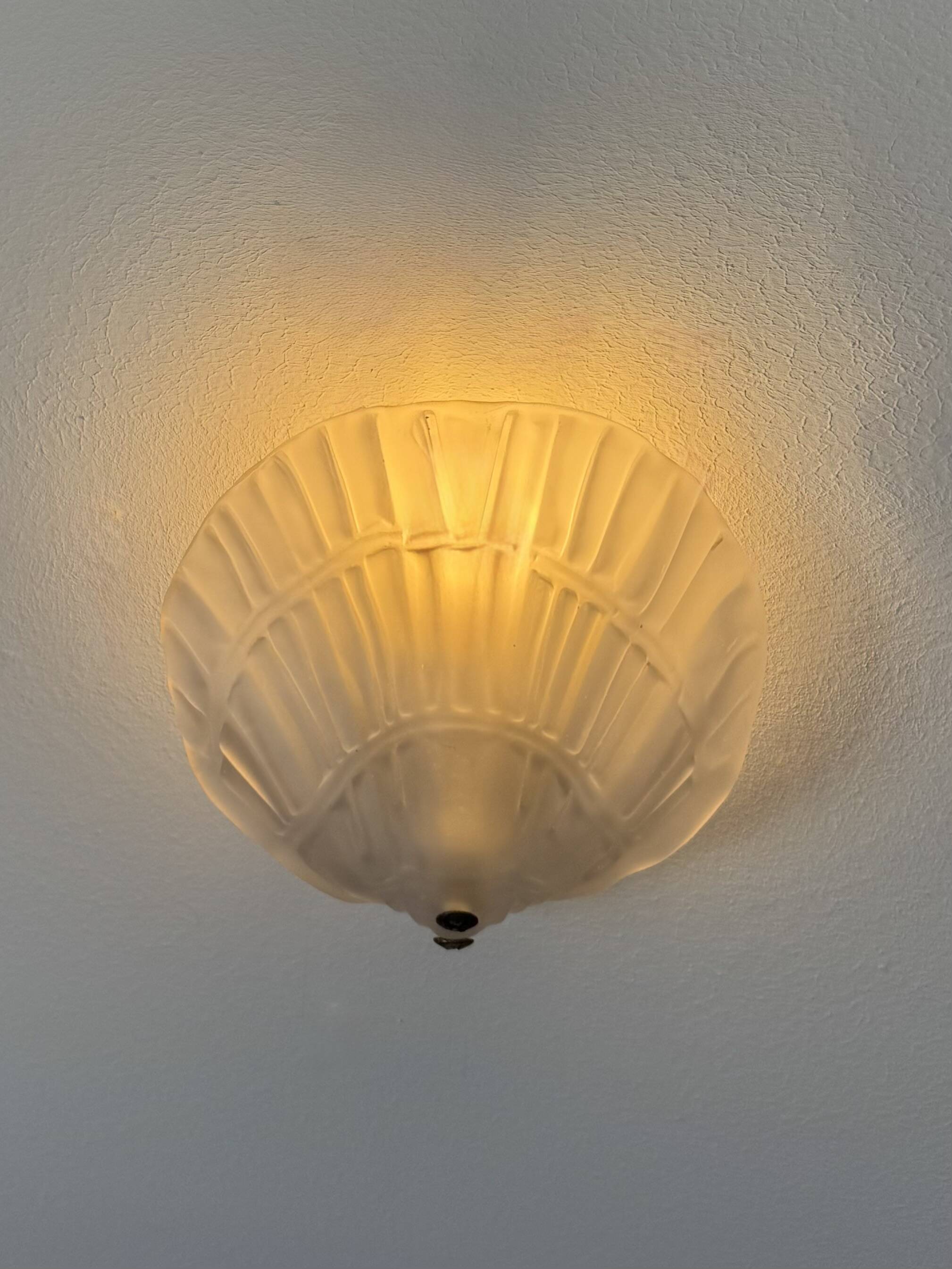 Pair of shell wall lights, frosted glass, France, 1970.