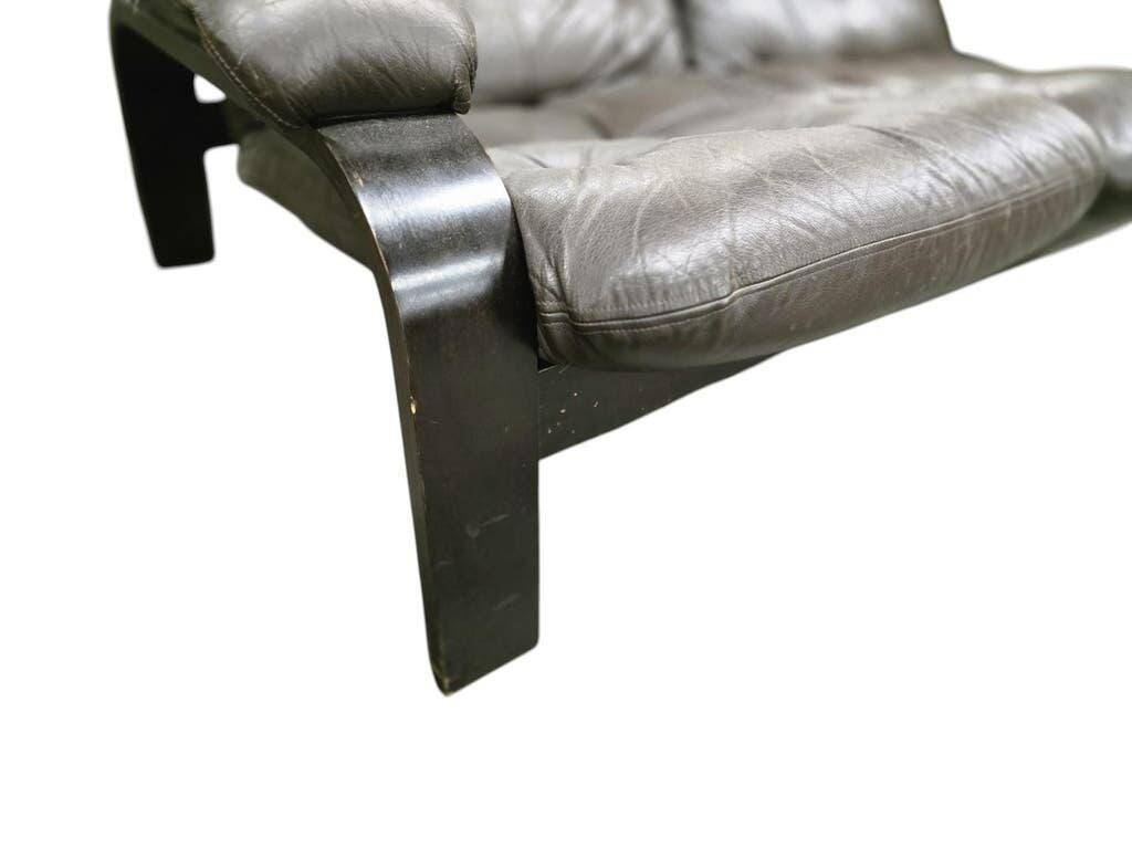 Vintage brown leather two-seater sofa